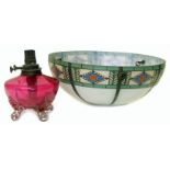 Edwardian coloured glass centre light shade and ruby glass oil lamp.