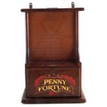 Penny Fortune drop game, applied 1922 patent metal label, with key, 56cm high The game appears to