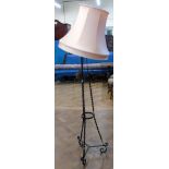 Early 20th centruy black painted wrought iron standard lamp complete with shade