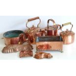 Two geo-copper kettles, copper watering can and two jelly moulds and two planters