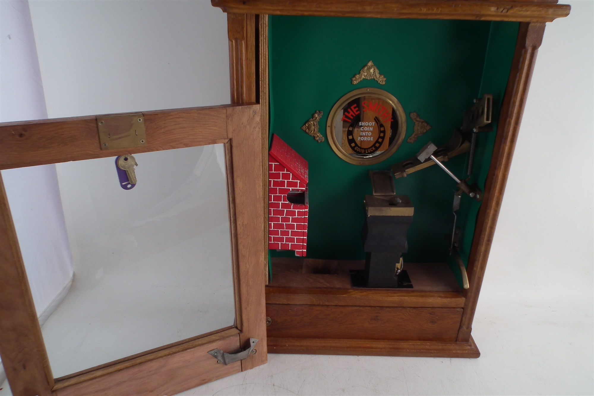 The Smithy penny slot flick machine reproduction, with four keys, 68.5cm high The machine appears to - Image 5 of 6