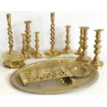 Four pairs of brass candlesticks, an oval brass tray, brass triver and chestnut roaster ect