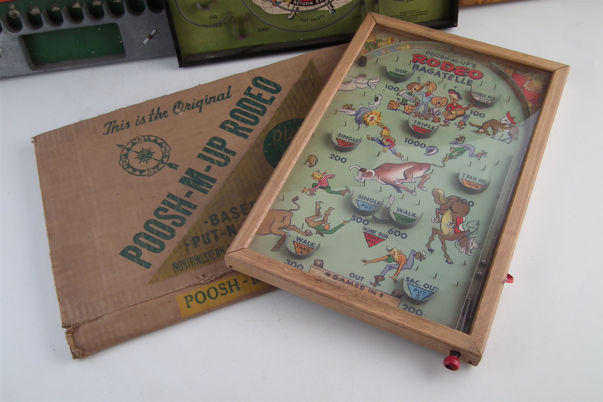 Four vintage Bagatelle board games, to include Poosh-Em-Up Rodeo, with box, Gotham Battle of the - Image 2 of 5