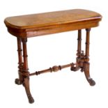 Victorian figured walnut fold-over card table, rectangular top with satinwood stringing, green