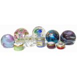Paperweights by Swarovski, Okra, Caithness, also four Halcyon Days / Staffordshire Enamels boxes
