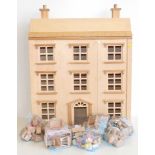 Wooden dolls house and a quantity of wooden dolls house furniture. Condition reports are not