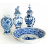 Three Delft hexagonal vases, two covers and a charger. Condition reports are not available for