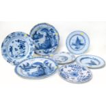 Seven Delft blue and white plates (most with damages)