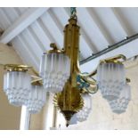 Brass Art Deco style six branch centre light fitting with six frosted glass shades and one spare.