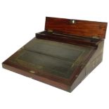 Victorian mahogany writing slope with brass military style carrying handle and bound edges.