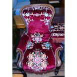 Victorian Gentleman's deep buttoned arm chair with mahogany frame. Condition reports are not