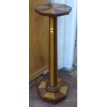 Art Deco mahogany and satinwood jardinier stand on tapered column with hexagonal base and top.