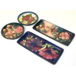 Four Moorcroft dishes, 1st quality. Condition reports are not available for Interiors Sale