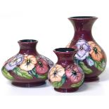 Three Moorcroft pansy pattern vases, 1st quality, the largest stands 16cm high Condition reports are
