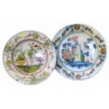 Two Delft chargers (restored/filled sections). Condition reports are not available for Interiors