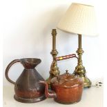 Copper one gallon jug, copper kettle, pair brass table lamps. Condition reports are not available