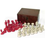 Ivory Staunton pattern chess set, natural and stained red (one pawn missing ball finial) all in