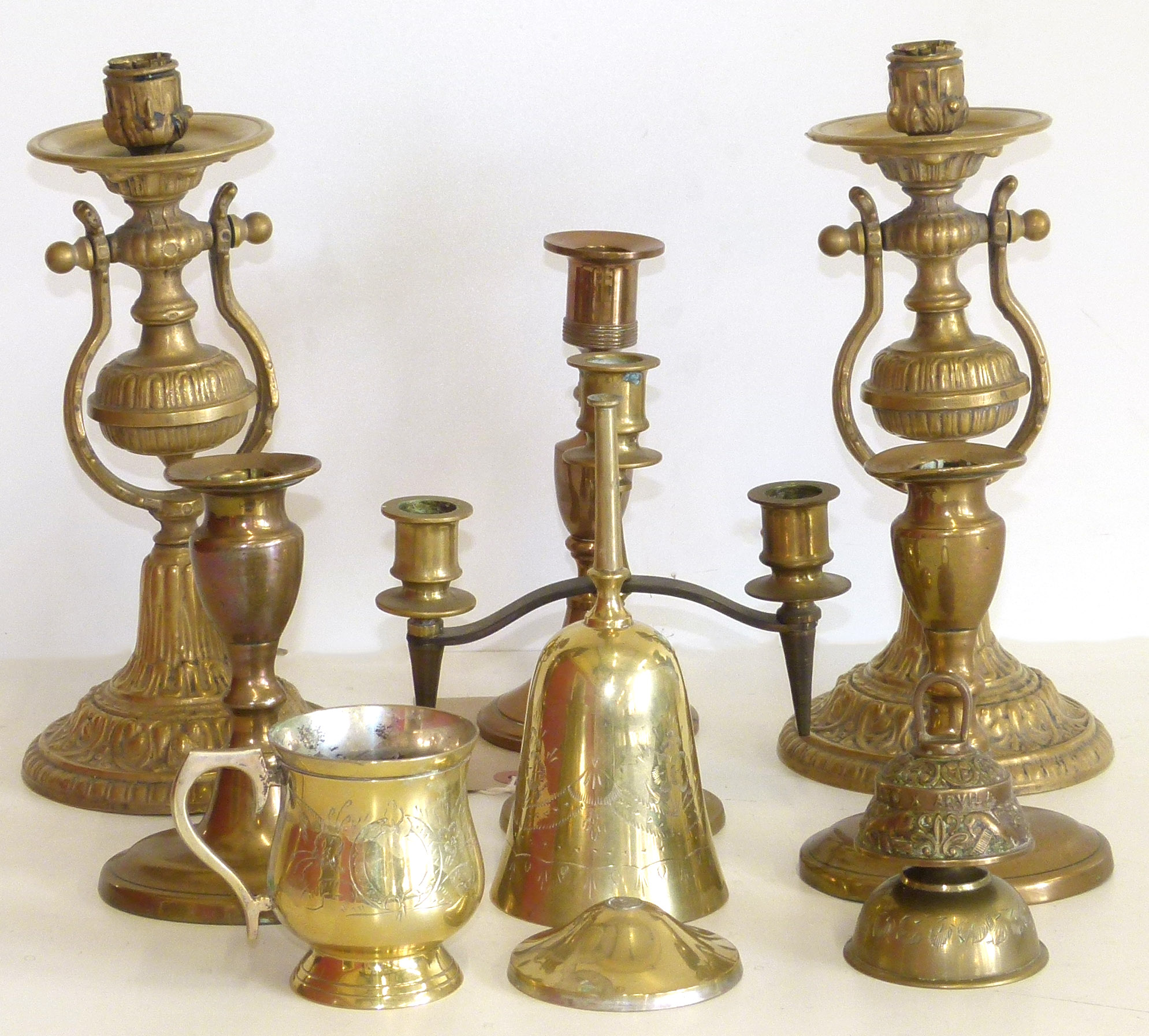 Pair of wall mounted brass swivel sconces, pair 14cm candlesticks on oval bases etc. Condition