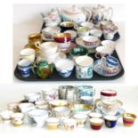 Collection of cups and saucers and three teapots 19th/20th century. Condition reports are not
