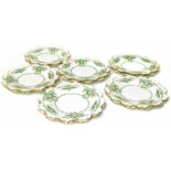 Twelve Royal Crown Derby 22cm plates with green ribbon and floral decoration Condition reports are