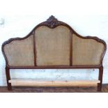 French style headboard with carved leaf decoration and three split cane panels. Condition reports