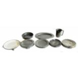 Oval pewter platter and five food warming plates, some with London touch marks, Watts (London) 9.