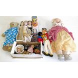 A collection of dolls to include four wooden dolls, Victorian plaster head doll, two other similar