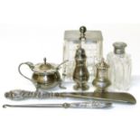 Cut glass jam pot with silver lid, two pepper pots, mustard pot, shoe horn etc. Condition reports