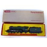 Trian-ang Hornby "Flying Scotsman" and tender in box with sleeve. Condition reports are not