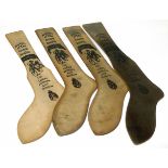 Four wooden "Saffro" hosiery leg shaped displays, sizes 10 1/2 xs and 9 1/2 dated 1941, 1942, 1943