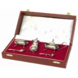 A cased silver cruet set