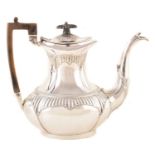 A Victorian silver coffee pot