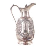 An early 20th Century silver water jug