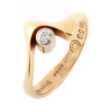 A Georg Jensen diamond solitaire 14ct gold wishbone ring.