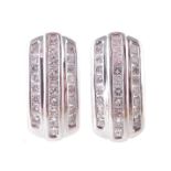 A pair of diamond earrings,