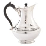 A Victorian silver hot water jug