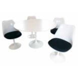 Eoro Saarinen for Knoll Studio 1956 circular table and four tulip chairs.
