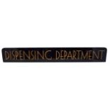 Black glass panel engraved "Dispensing Department".