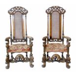 Pair of 19th century Continental walnut framed open arm chairs.