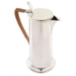 Edwardian silver hot water jug by Goldsmiths & Silversmiths