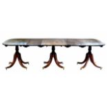 George III mahogany three-pillar dining table.