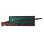 Percussion 20 bore sporting gun fitted into a period case, the underside of the smooth bored