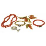 A selection of jewellery to include coral beads, coral brooches fob watch and bangle Condition
