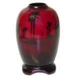 Royal Doulton flambe vase depicting desert scene, 8cm tall. Condition reports are not available