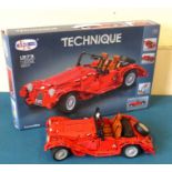 Technique (1273) V.6 red Morgan convertible, complete with box. Condition reports are not