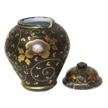 Chinese imitation lacquer vase, some damages and losses to the rim. 22cm high Condition reports
