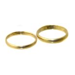 Two band rings, one with inscription dated 1907, ring sizes R and S, gross weight 5.7g. Condition