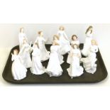 Twelve Royal Doulton white figures of ladies Condition reports are not available for our Interiors