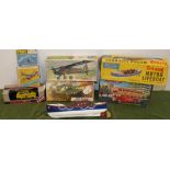 Boxed Triang motor lifeboat, Playland London bus ("Will not fall off the table"), Airfix DHC-2