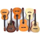 Six nylon strung guitars